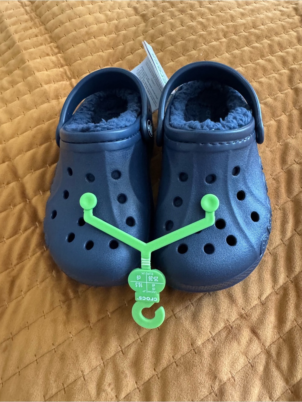CROCS Kids Navy Fuzzy Lined Clogs with Green Hanger